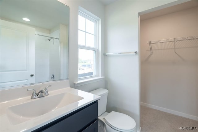 14631 Hancock Towns Dr Unit N6, Chesterfield, VA 23832 - bathroom with vanity, a spacious closet, and recessed lighting