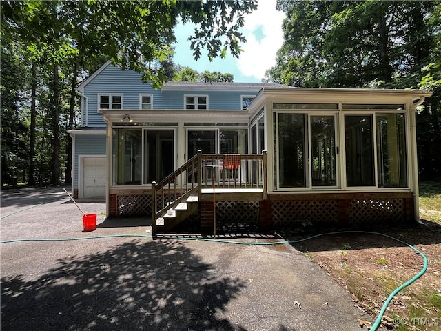 16200 Hunters Ridge Ln, Moseley, VA 23120 - rear view of property featuring a sunroom