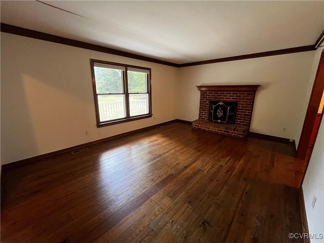 16200 Hunters Ridge Ln, Moseley, VA 23120 - unfurnished living room with dark wood-type flooring, ornamental molding, and a brick fireplace