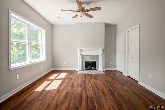 2502 4th Ave, Richmond, VA 23222 - unfurnished living room featuring a ceiling fan, dark wood-style floors, and a tiled fireplace
