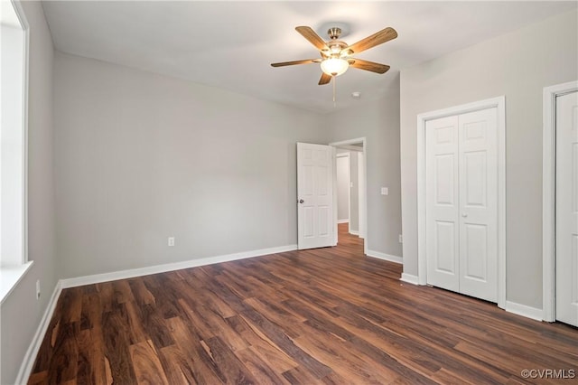 2502 4th Ave, Richmond, VA 23222 - unfurnished bedroom with dark wood-type flooring and ceiling fan