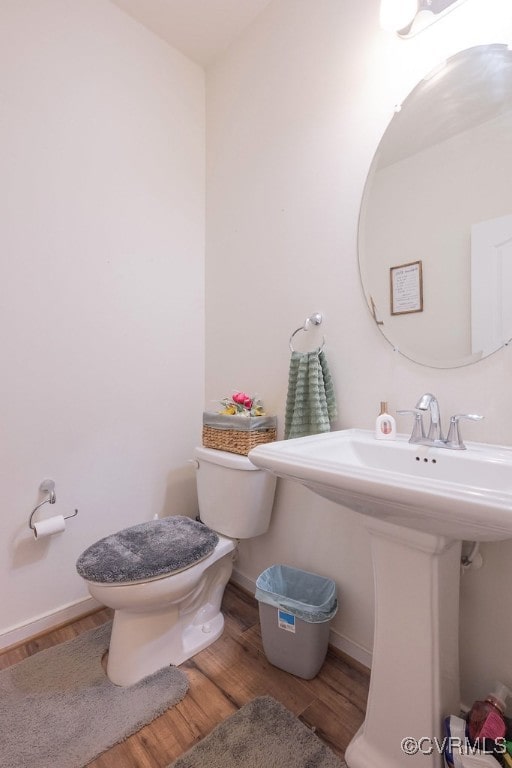 9545 Thornecrest Dr, Mechanicsville, VA 23116 - bathroom with wood finished floors and toilet