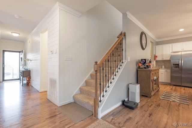 9545 Thornecrest Dr, Mechanicsville, VA 23116 - stairway featuring ornamental molding and wood finished floors