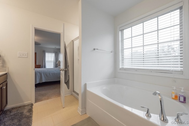 9545 Thornecrest Dr, Mechanicsville, VA 23116 - ensuite bathroom with vanity, a bath, and a shower stall