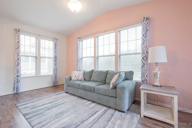 9545 Thornecrest Dr, Mechanicsville, VA 23116 - living room featuring vaulted ceiling and wood finished floors