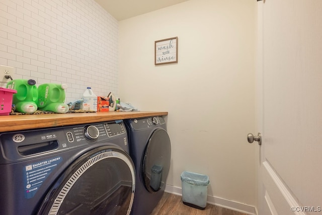 9545 Thornecrest Dr, Mechanicsville, VA 23116 - washroom featuring washer and clothes dryer and wood finished floors