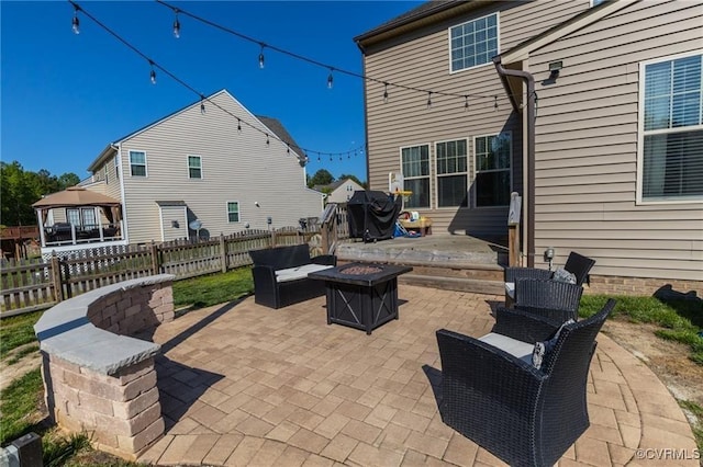 9545 Thornecrest Dr, Mechanicsville, VA 23116 - view of patio / terrace with an outdoor fire pit