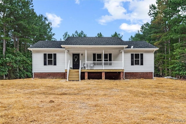 487 Deep Landing Rd, Tappahannock, VA 22560 - view of front facade with covered porch, roof with shingles, and crawl space
