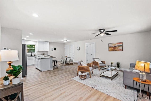 487 Deep Landing Rd, Tappahannock, VA 22560 - living area featuring light wood-style floors, recessed lighting, and ceiling fan