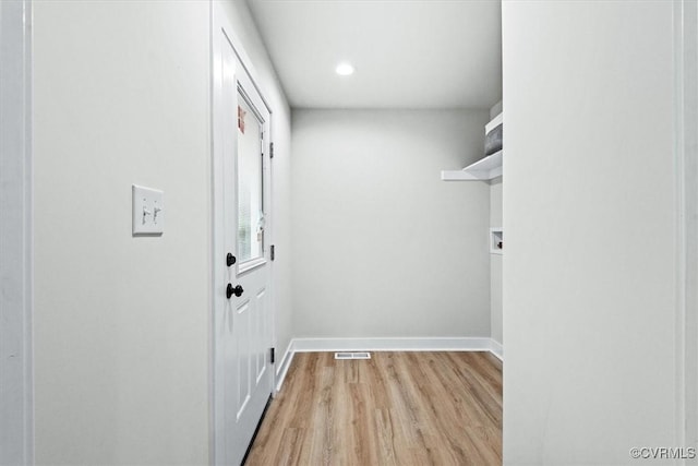 487 Deep Landing Rd, Tappahannock, VA 22560 - laundry room featuring light wood-style flooring, washer hookup, and recessed lighting