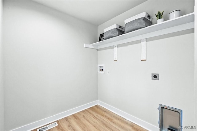 487 Deep Landing Rd, Tappahannock, VA 22560 - laundry room featuring hookup for a washing machine, light wood-type flooring, and hookup for an electric dryer