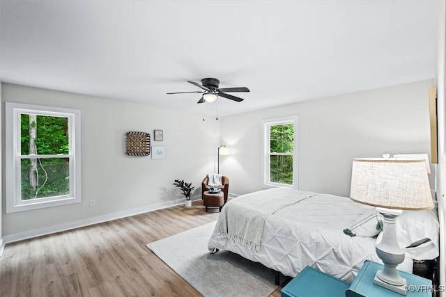 487 Deep Landing Rd, Tappahannock, VA 22560 - bedroom with wood finished floors and ceiling fan