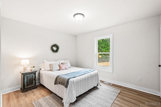 487 Deep Landing Rd, Tappahannock, VA 22560 - bedroom featuring light wood-type flooring and baseboards