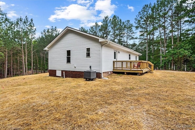 487 Deep Landing Rd, Tappahannock, VA 22560 - view of side of property with a deck, a lawn, and crawl space