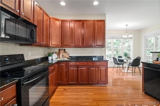4313 Nevil Bend Turn, Moseley, VA 23120 - kitchen featuring black appliances, light wood-type flooring, a chandelier, tasteful backsplash, and recessed lighting