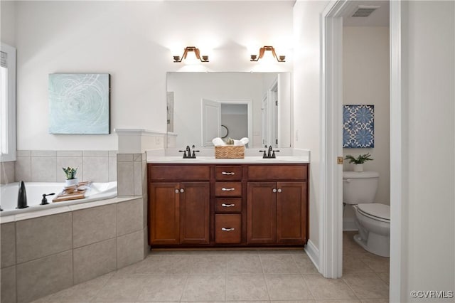4313 Nevil Bend Turn, Moseley, VA 23120 - bathroom featuring tile patterned floors, double vanity, and a garden tub
