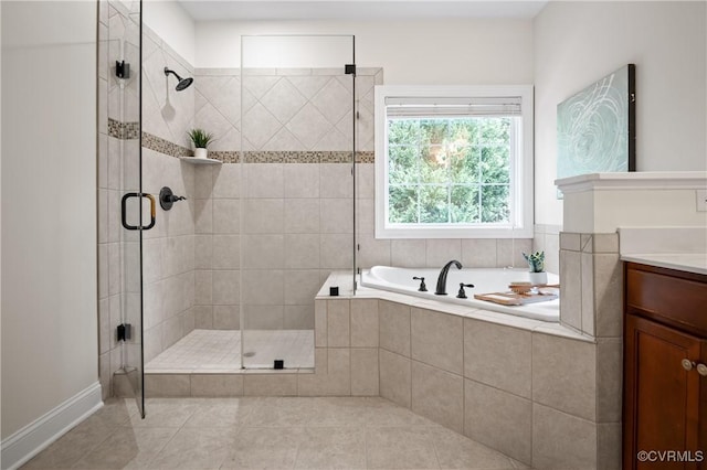 4313 Nevil Bend Turn, Moseley, VA 23120 - bathroom featuring tile patterned floors, a garden tub, a stall shower, and vanity