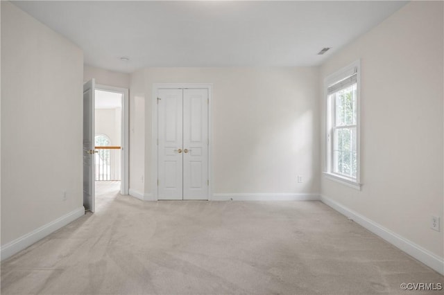 4313 Nevil Bend Turn, Moseley, VA 23120 - unfurnished bedroom with light carpet and a closet