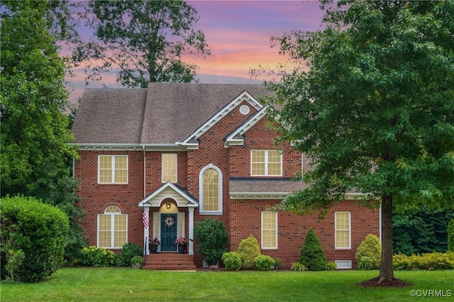 4313 Nevil Bend Turn, Moseley, VA 23120 - view of front of house featuring a front yard, brick siding, and roof with shingles