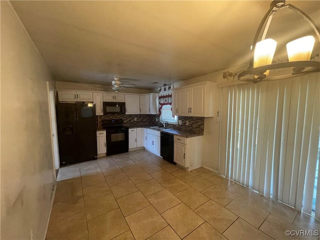 38 Spring Ct, Petersburg, VA 23803 - kitchen with black appliances, dark countertops, tasteful backsplash, and white cabinets