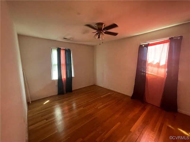 38 Spring Ct, Petersburg, VA 23803 - empty room featuring healthy amount of natural light, wood finished floors, and ceiling fan