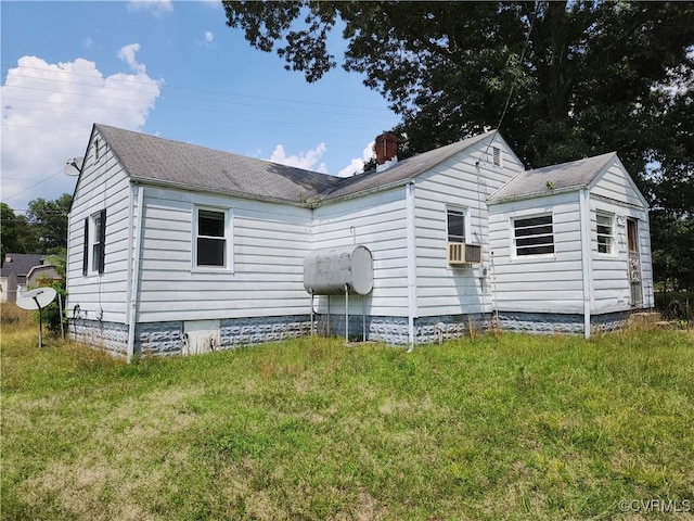 25521 Ferndale Rd, Petersburg, VA 23803 - rear view of house featuring a lawn, roof with shingles, cooling unit, and oil tank