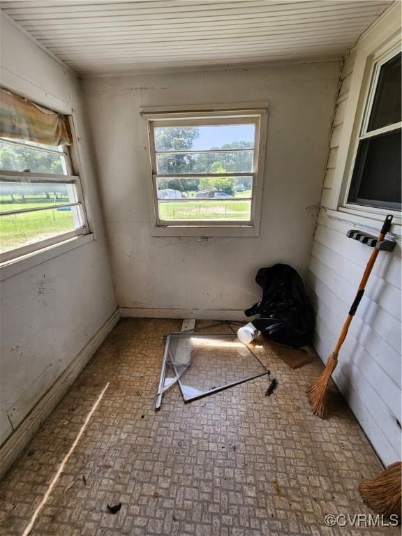 25521 Ferndale Rd, Petersburg, VA 23803 - unfurnished room featuring brick patterned floors and wooden ceiling
