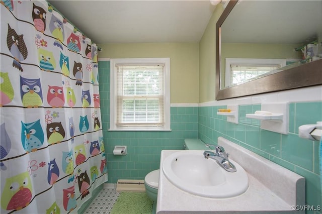916 Forestview Dr, Colonial Heights, VA 23834 - full bathroom featuring tile walls, wainscoting, vanity, and a shower with curtain