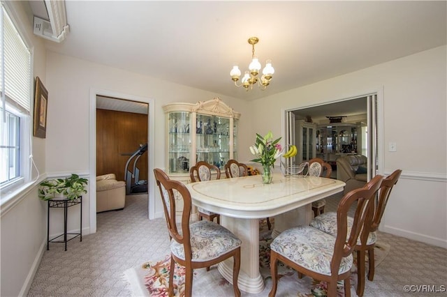 916 Forestview Dr, Colonial Heights, VA 23834 - dining area with a chandelier and light colored carpet
