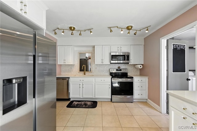 108 Bristol Ave, Norfolk, VA 23502 - kitchen featuring appliances with stainless steel finishes, light countertops, tasteful backsplash, light tile patterned floors, and ornamental molding