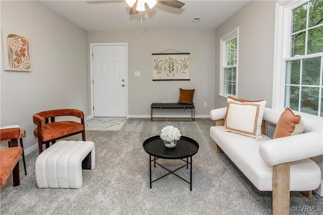 7856 Epic Rd, Midlothian, VA 23235 - living area with carpet flooring, a ceiling fan, and healthy amount of natural light
