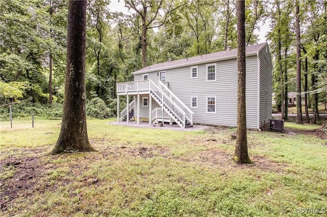 7856 Epic Rd, Midlothian, VA 23235 - rear view of house featuring stairs, a deck, a lawn, and view of wooded area