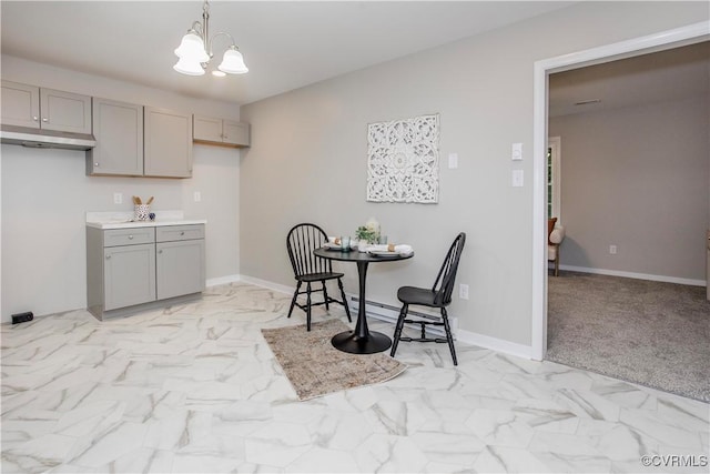 7856 Epic Rd, Midlothian, VA 23235 - dining space with light marble finish flooring and a chandelier