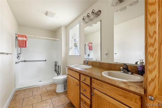 3899 Howell Rd, Powhatan, VA 23139 - full bathroom with double vanity, a shower, and tile patterned flooring