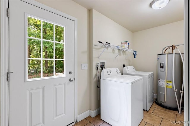 3899 Howell Rd, Powhatan, VA 23139 - washroom with electric water heater, independent washer and dryer, and light tile patterned flooring