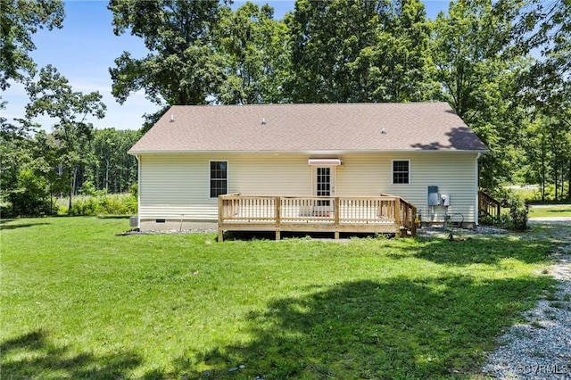 3899 Howell Rd, Powhatan, VA 23139 - rear view of house with crawl space, a deck, and a lawn