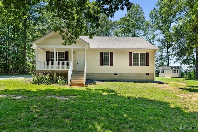 3899 Howell Rd, Powhatan, VA 23139 - view of front of house featuring crawl space, covered porch, and a front yard