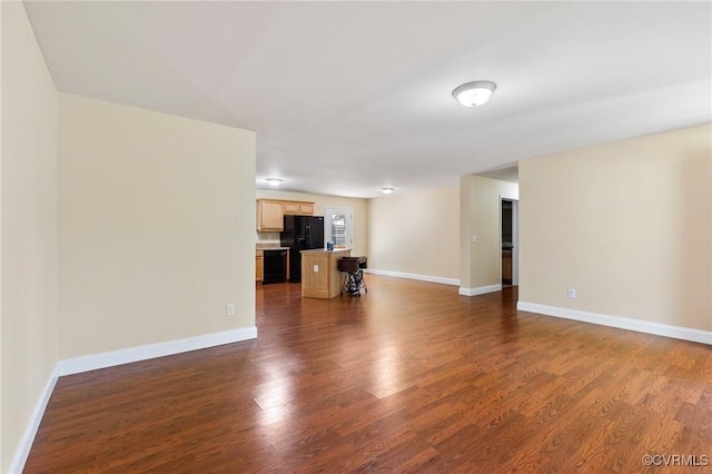 3899 Howell Rd, Powhatan, VA 23139 - unfurnished living room with dark wood-type flooring and baseboards