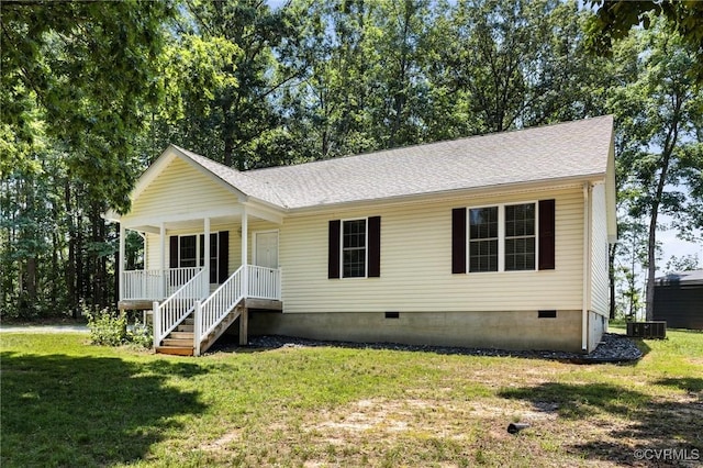 3899 Howell Rd, Powhatan, VA 23139 - view of front facade featuring crawl space, a porch, a front lawn, and a shingled roof