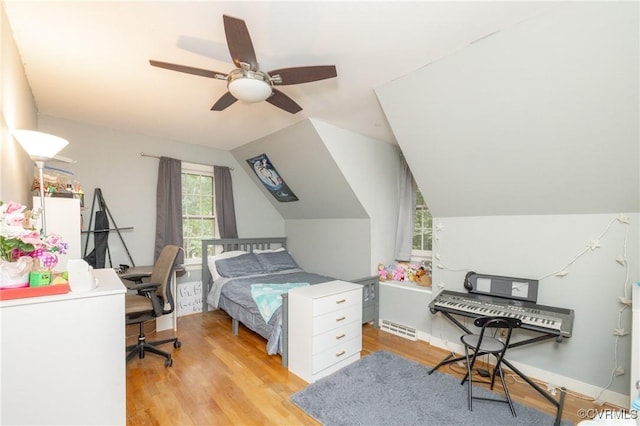 3949 Llewellyn Ln, Chesterfield, VA 23832 - bedroom with light wood-style floors, vaulted ceiling, and a ceiling fan