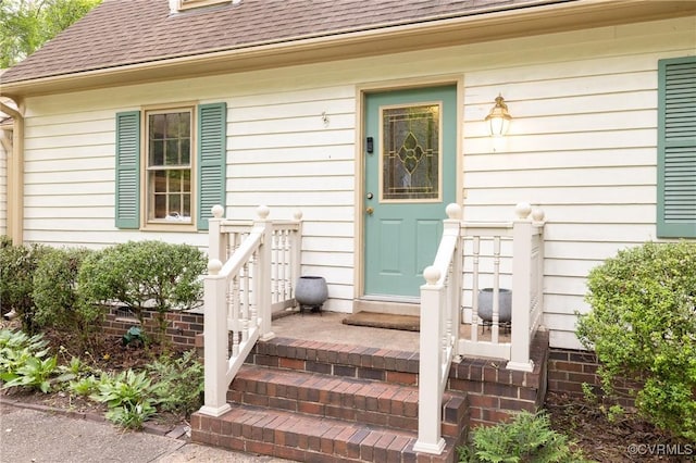 3949 Llewellyn Ln, Chesterfield, VA 23832 - view of exterior entry featuring roof with shingles