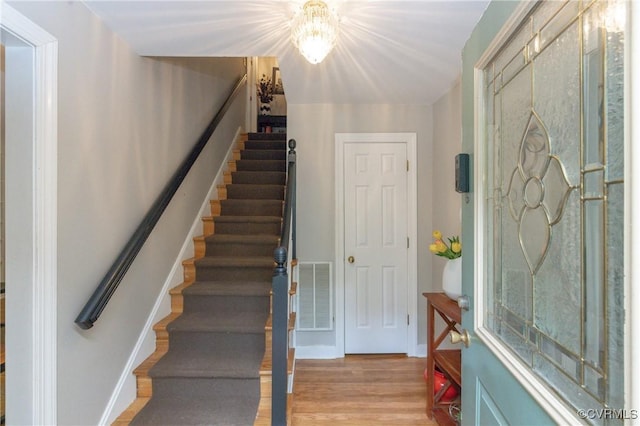 3949 Llewellyn Ln, Chesterfield, VA 23832 - foyer entrance featuring stairway, light wood-type flooring, and a chandelier