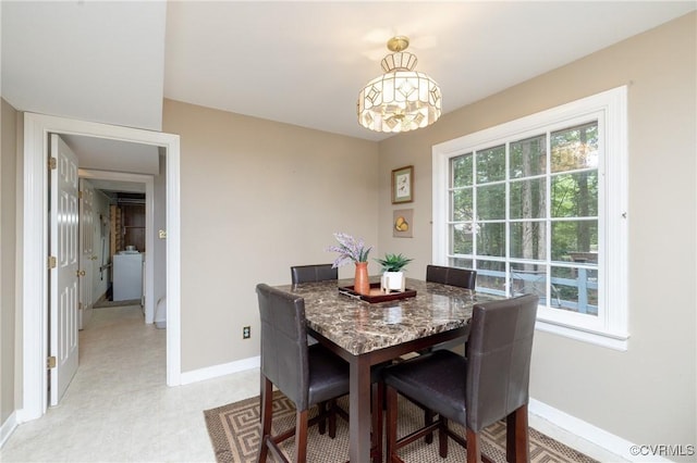 3949 Llewellyn Ln, Chesterfield, VA 23832 - dining room featuring baseboards and a chandelier