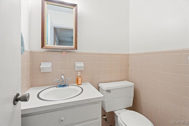 43 Franktown Rd, Hampton, VA 23663 - bathroom with vanity, tile walls, and a wainscoted wall