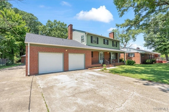 43 Franktown Rd, Hampton, VA 23663 - traditional-style house featuring brick siding, a garage, a chimney, a porch, and concrete driveway