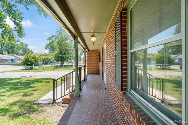 43 Franktown Rd, Hampton, VA 23663 - porch featuring a lawn