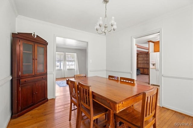 43 Franktown Rd, Hampton, VA 23663 - dining space with light wood-style flooring, a chandelier, and crown molding