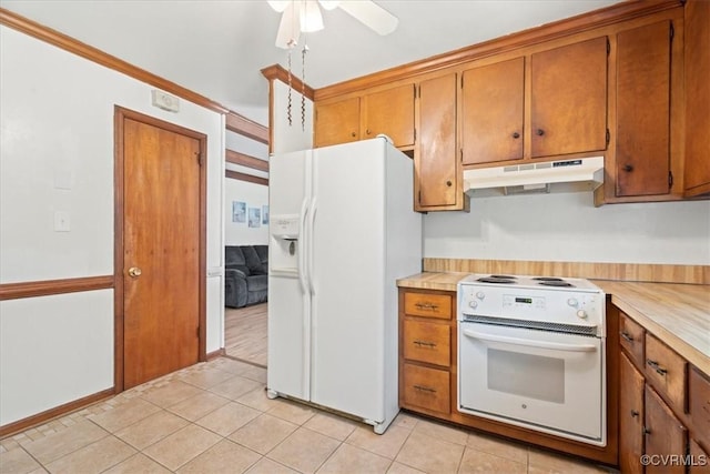 43 Franktown Rd, Hampton, VA 23663 - kitchen with white appliances, under cabinet range hood, light countertops, brown cabinetry, and light tile patterned flooring