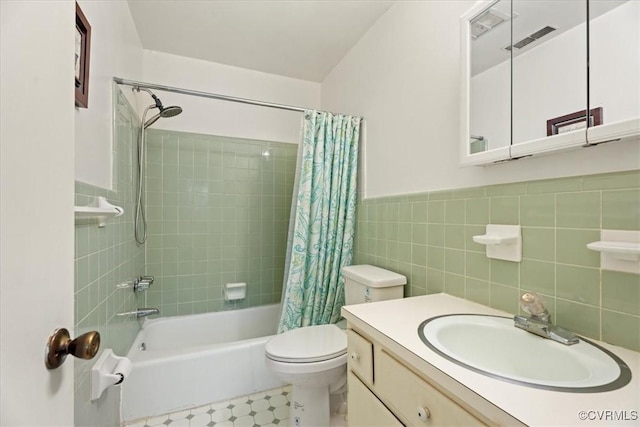 43 Franktown Rd, Hampton, VA 23663 - full bath with shower / tub combo with curtain, tile walls, vanity, and a wainscoted wall