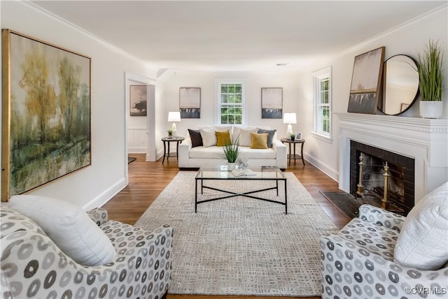 1217 Forest Ave, Henrico, VA 23229 - living area featuring wood finished floors, ornamental molding, and a fireplace